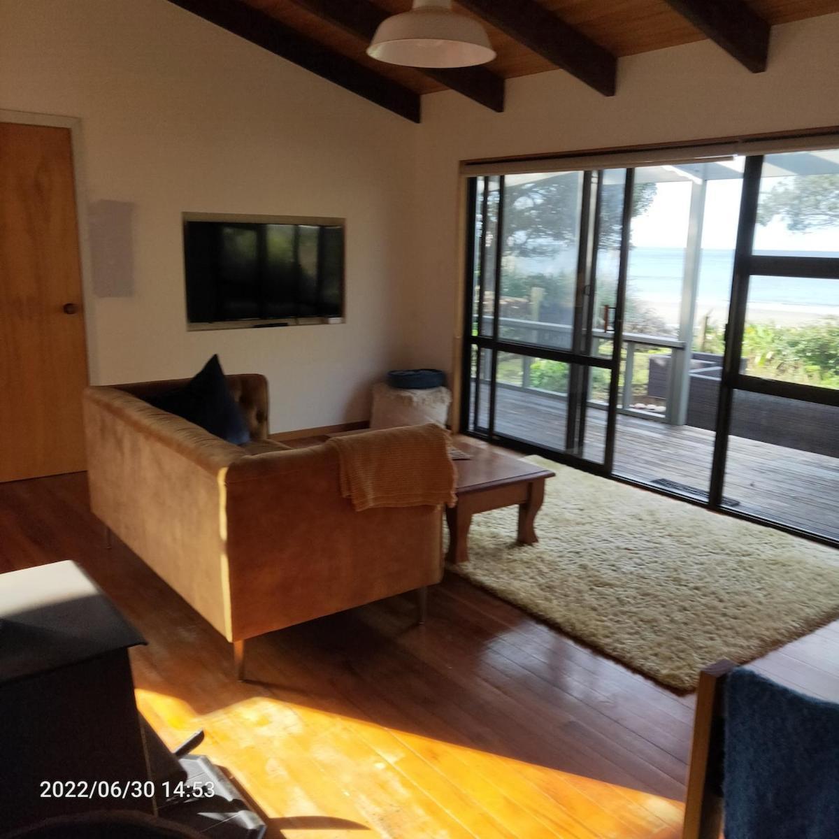 Beachfront Bliss - Your Parapara Seaside Retreat Exteriör bild